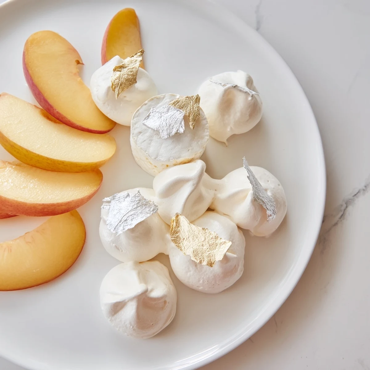 Freshly prepared The Pearly Gates cheese board, showcasing brie, peaches, and sweet meringue's fine details.