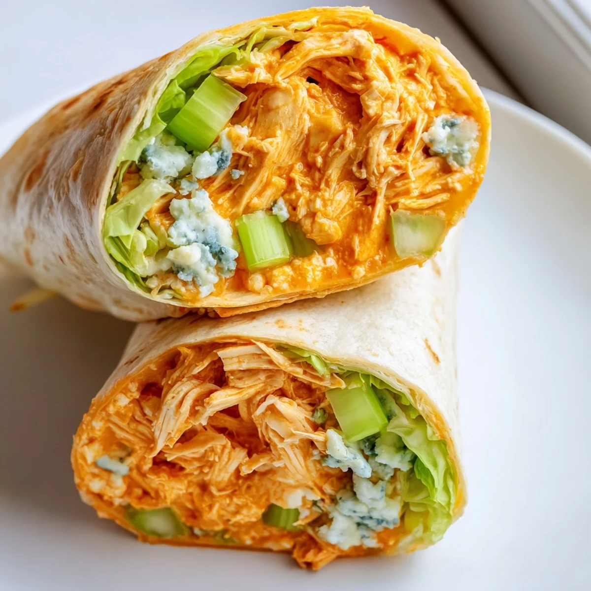 Golden, grilled Buffalo Chicken Dip Wraps, with a creamy, spicy chicken filling, ready to serve and enjoy.