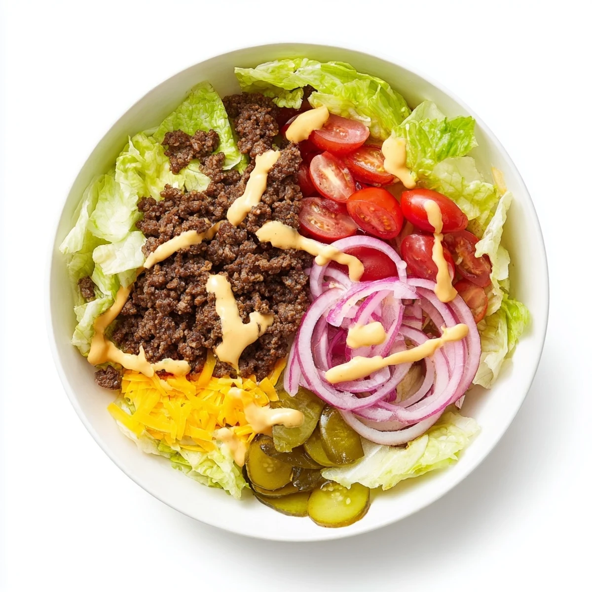 Enjoy the Big Mac in a Bowl recipe, a low-carb meal packed with savory beef and crunchy vegetables.