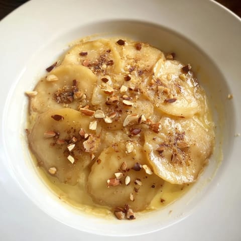 Warm, baked Rustic Crustless Apple Pie with a custard filling, perfect for a cozy autumn treat.
