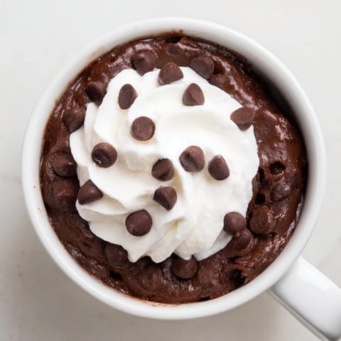 Warm, gooey chocolate mug cake, a quick and easy single-serving dessert, ready in minutes.
