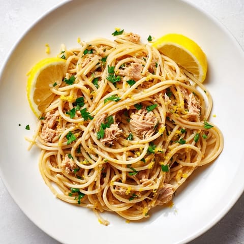 Enjoy a close-up of the delicious Lemon-Garlic Tuna Spaghetti, ready for a quick and easy dinner.