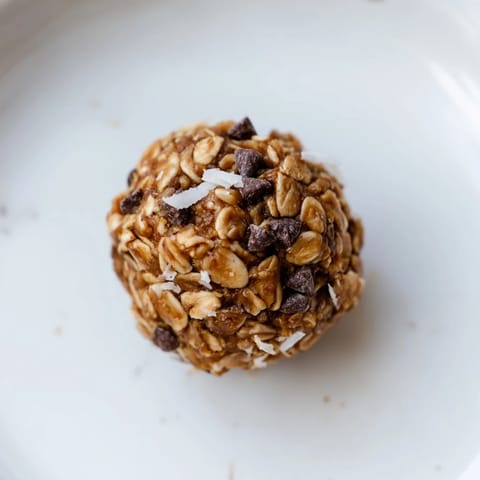 A close-up shot of delicious Almond-Chia Energy Bites, showing the texture with visible chia seeds.