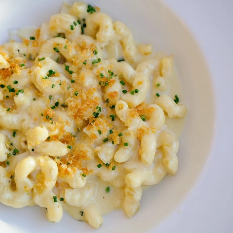 Warm and inviting, this creamy Stove-Top Mac and Cheese features perfectly coated, cheesy pasta.