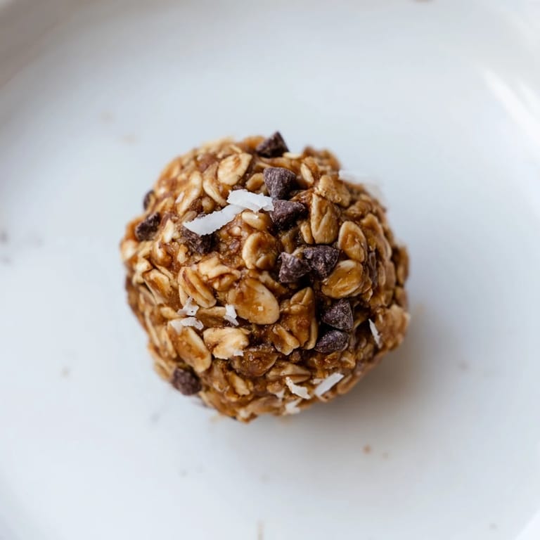 A close-up shot of delicious Almond-Chia Energy Bites, showing the texture with visible chia seeds.